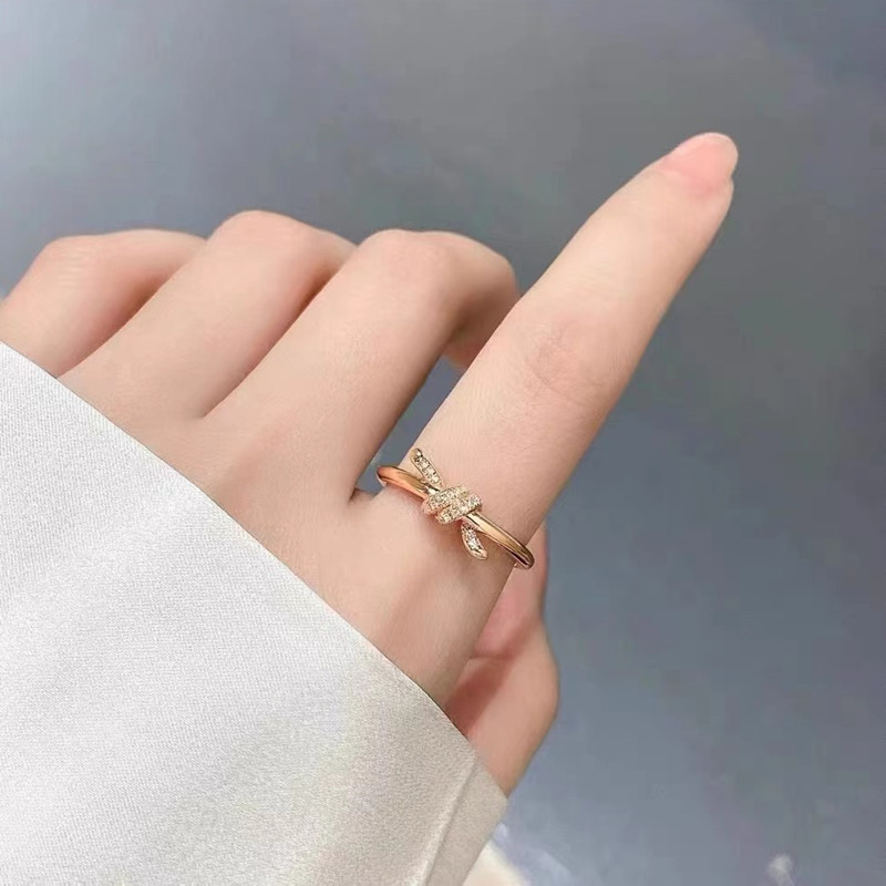 Tホーム同じスタイルノットノットリング女性スターリングシルバー18Kローズゴールドカラーゴールドボウライト高級ファッションツイストロープリング