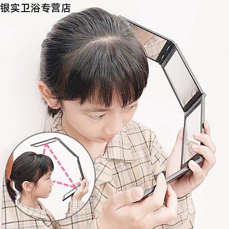 Cut your own hair in four mirrors can look back at the folding mirror behind the back of the head with the makeup mirror three-dimensional