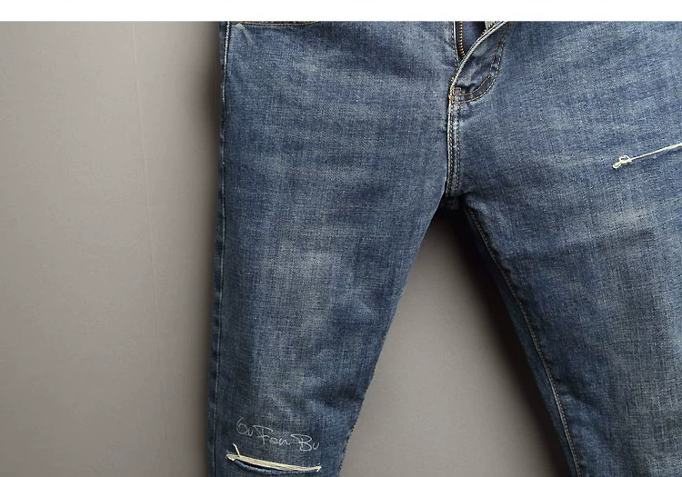 Dongdaemun dao xanh cắt một lỗ in quần jean nam thanh niên thời trang hoang dã quần lót nam