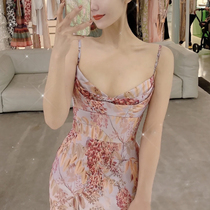 2021 new French style high-end temperament self-cultivation retro skirt niche waist slim suspenders floral dress summer