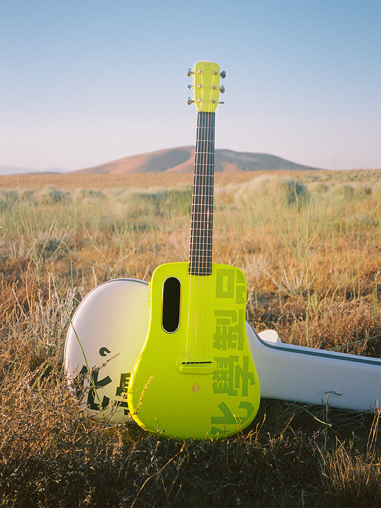 Take fire guitar LAVA ME2 carbon fiber 36 inch travel student full veneer folk guitar men and women electric box beginner