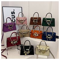 2025 summer new universal style women's bag texture Kelly bag hand-held cross-body women's bag work commuting briefcase