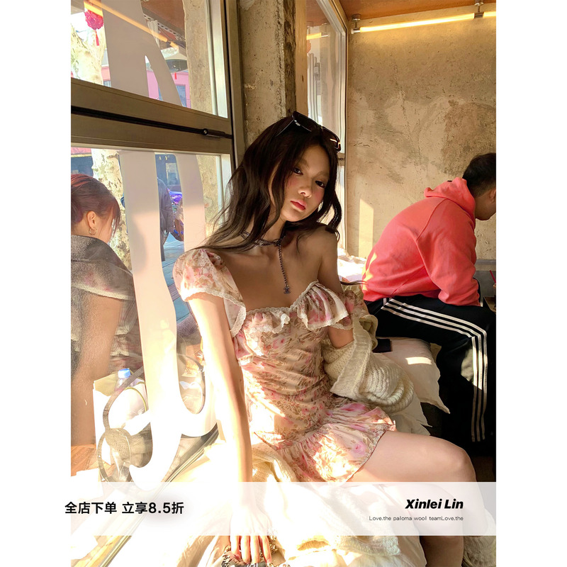 Xinlei Lin's New Floral Dress with a Hidden Parisian Flair, Featuring a Ruffled Hem, Backless Design, and Waist-Cinching Effect