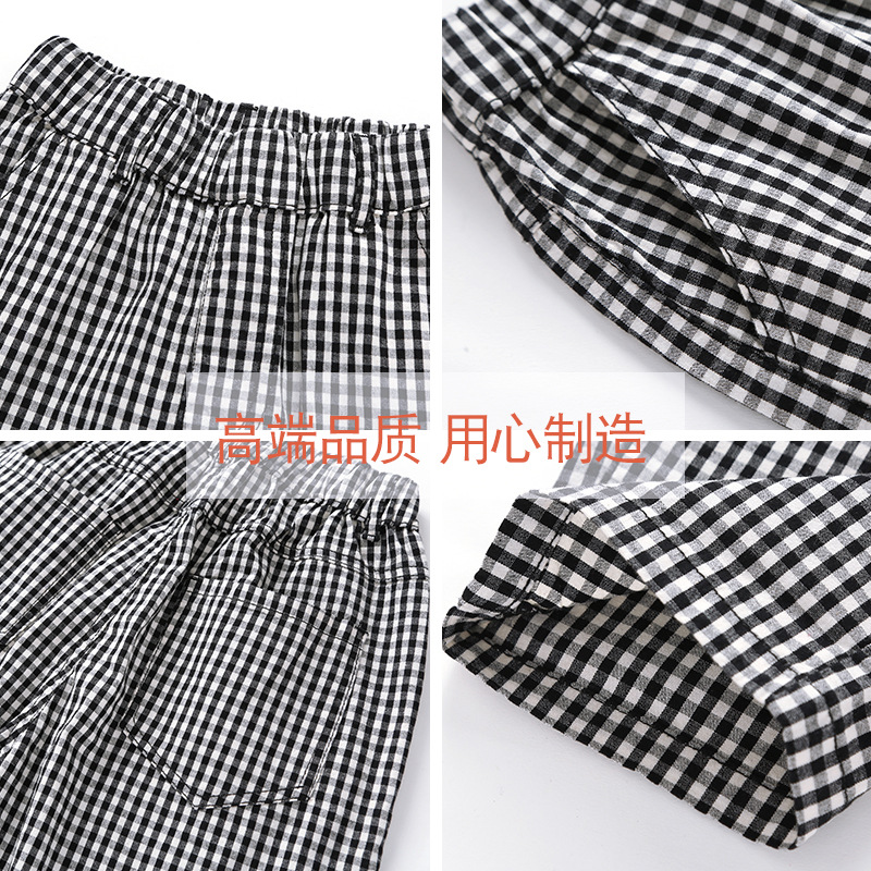 Cô gái quần mùa xuân / hè 2020 mới của Hàn Quốc phiên bản của trẻ em lớn loose-fitting lỏng quần bé kẻ sọc chín điểm quần rộng chân.