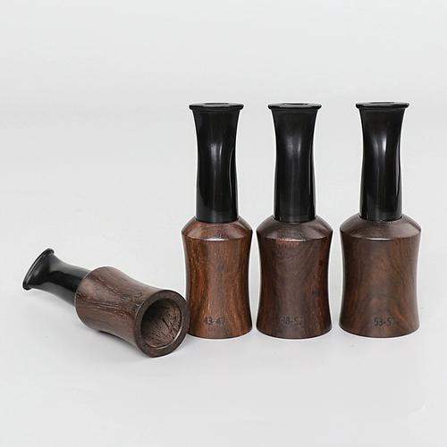 Девять -летняя старая магазин четыре цвета сигарет из древесных черных сигар, сигареты мужской фильтрации, можно распространять сплошную древесину, чтобы расширить рот, чтобы положить 9 -миллиметровый элемент фильтра