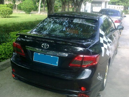 Toyota 06-13 Corolla đuôi carola đặc biệt sửa đổi đầu cánh vật liệu ABS lắp đặt với sơn độ đuôi gió xe ô tô