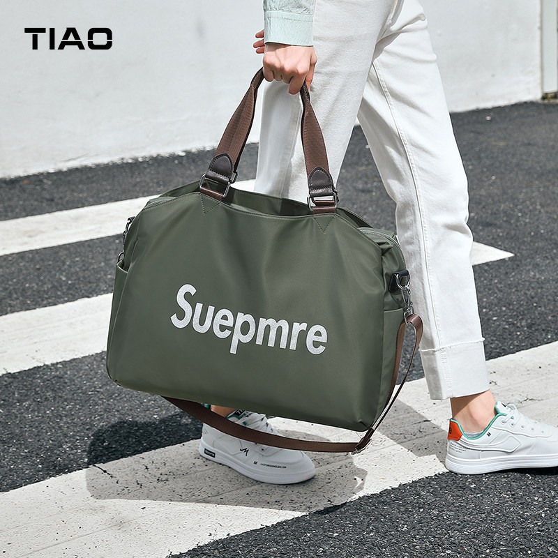 Short-distance portable large-capacity women's travel bag oversized lightweight business travel boarding tide bag dry and wet separation business luggage bag