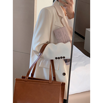 Suit jacket women 2021 early spring new Korean version of loose leisure advanced sense Joker rice white suit jacket