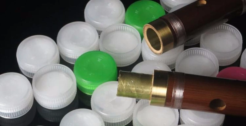 Tre sáo dây dưa chuột kim loại ốc vít bôi trơn rỉ sét chất đồng khóa dầu bôi trơn Tô Châu Gu Yue nhạc cụ phụ kiện - Nhạc cụ dân tộc