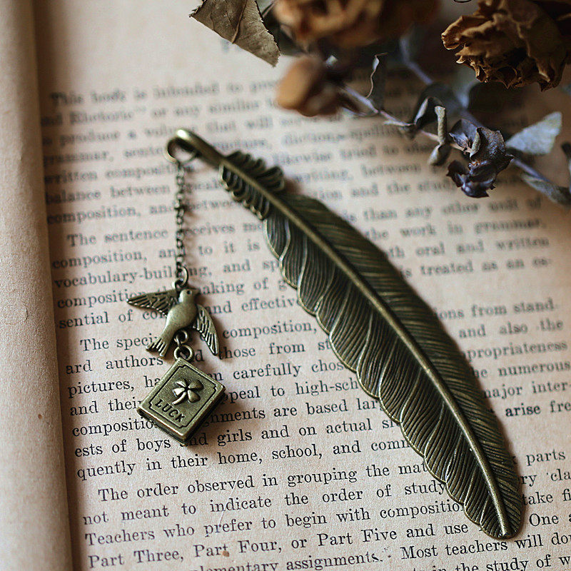 Yi Yangqianxi peripheral accessories, women's feather bookmarks, metal retro bird collection, swallows, creative four-leaf clover, roses