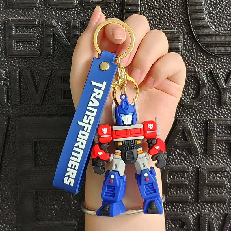 Robot Optimus Prime Backpack Keychain Pendant Cartoon Transformers Keychain Creative Resin Figurine Decoration Robot Optimus Prime Backpack Keychain Pendant Cartoon Transformers Keychain Creative Resin Figurine Decoration