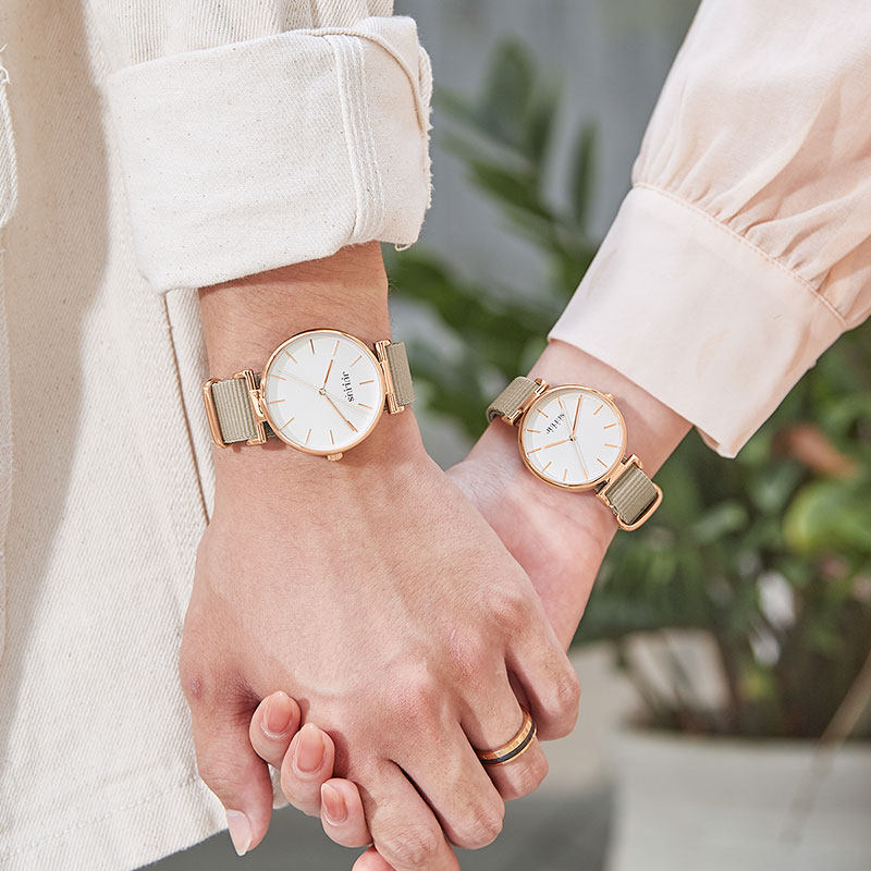 Gather together when the watch female simple temperament male watch minority light luxury INS sail cloth belt woman tide female expression pair table
