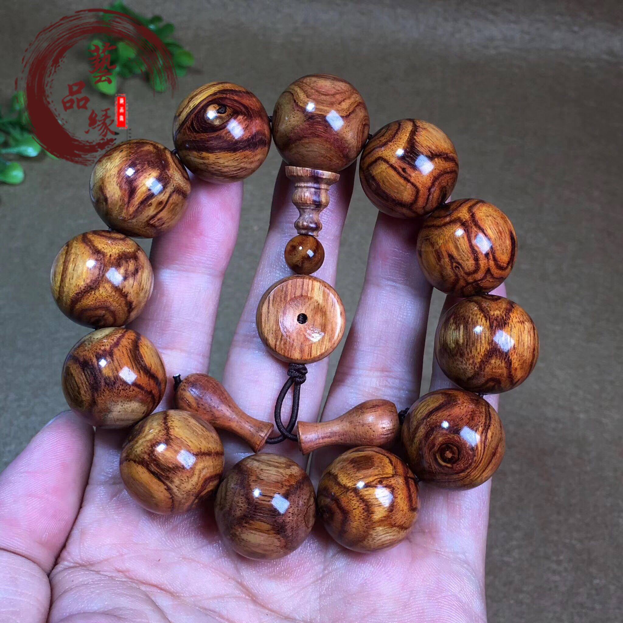 Old material l ghost face huanghuali bracelet 2 0 male Hainan ghost eye pattern sea yellow cross-eye bracelet