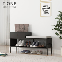 Entrance to the family door to the home door can sit on the bench with a stool integrated into the door containing storage shoe rack light lavish wearing a shoe stool