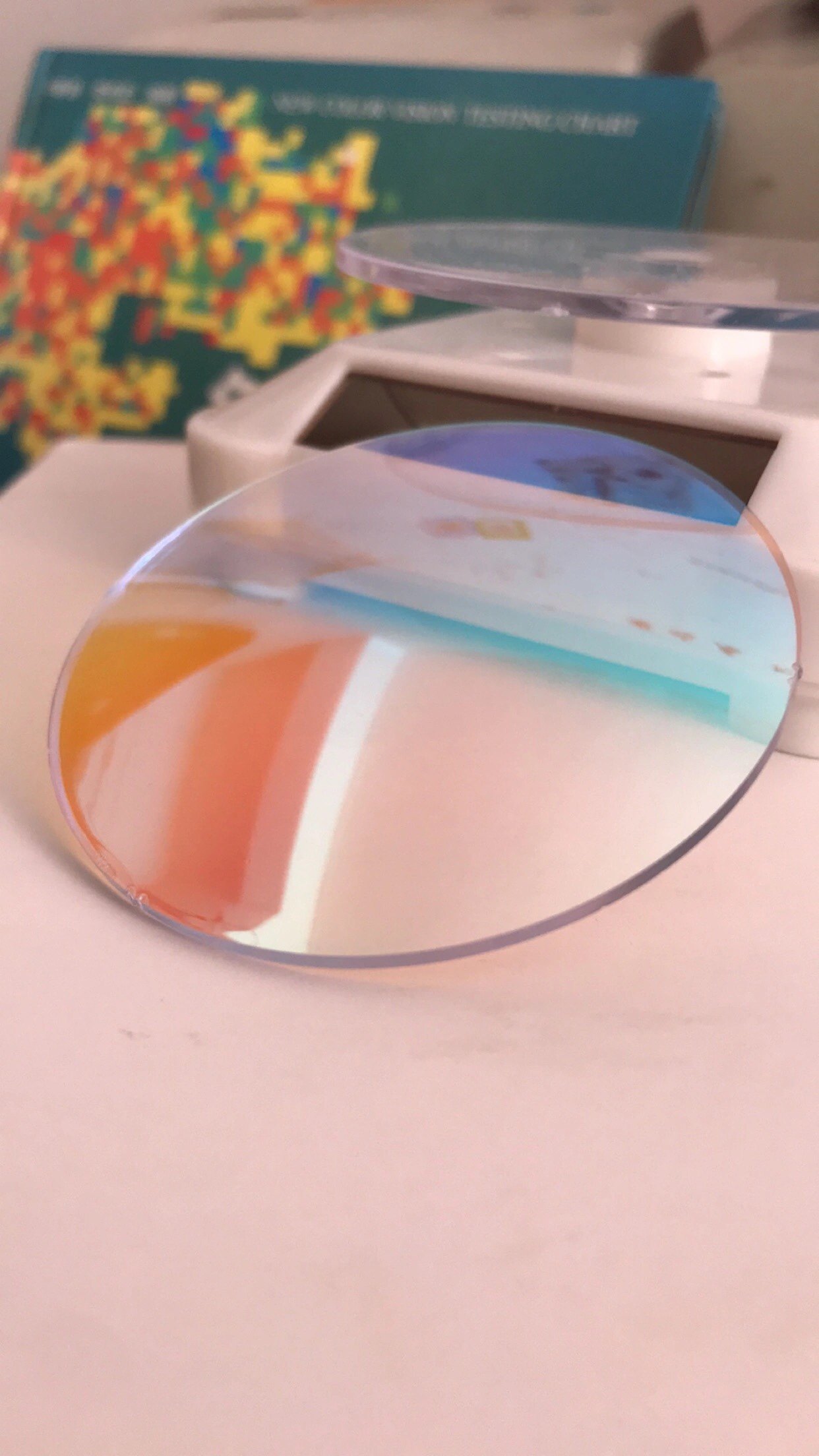 Double-sided coating approximately transparent color-blind color-weak spectacle lenses for red and green