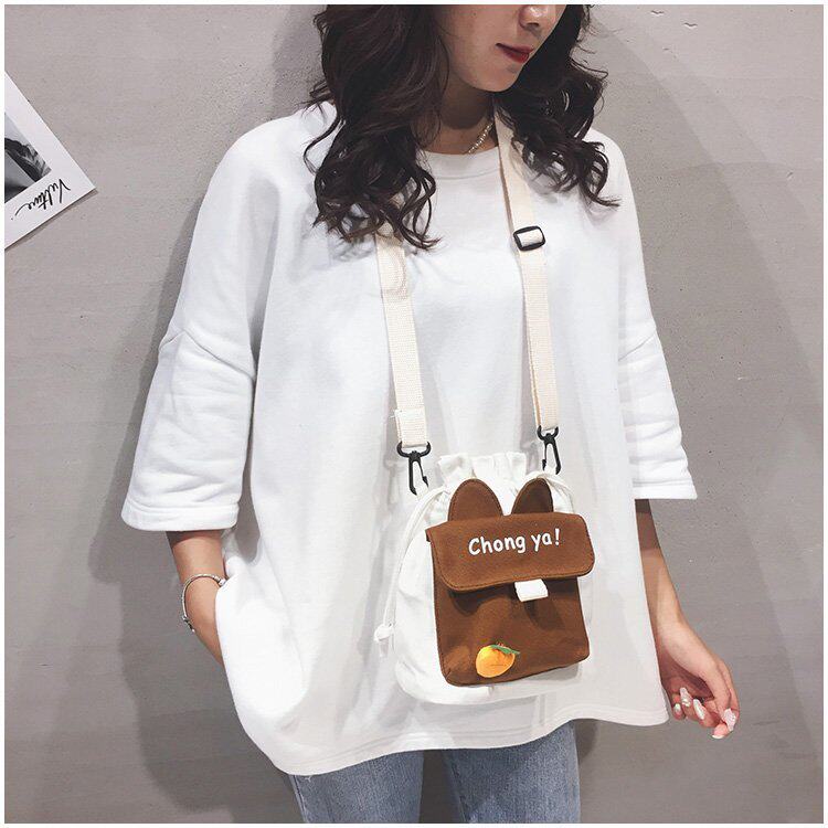 Детская сумка на ремне 春夏新款学生帆布小包包甜美淑女撞色单肩包可爱潮挂件抽绳斜挎包 Jifanpaul