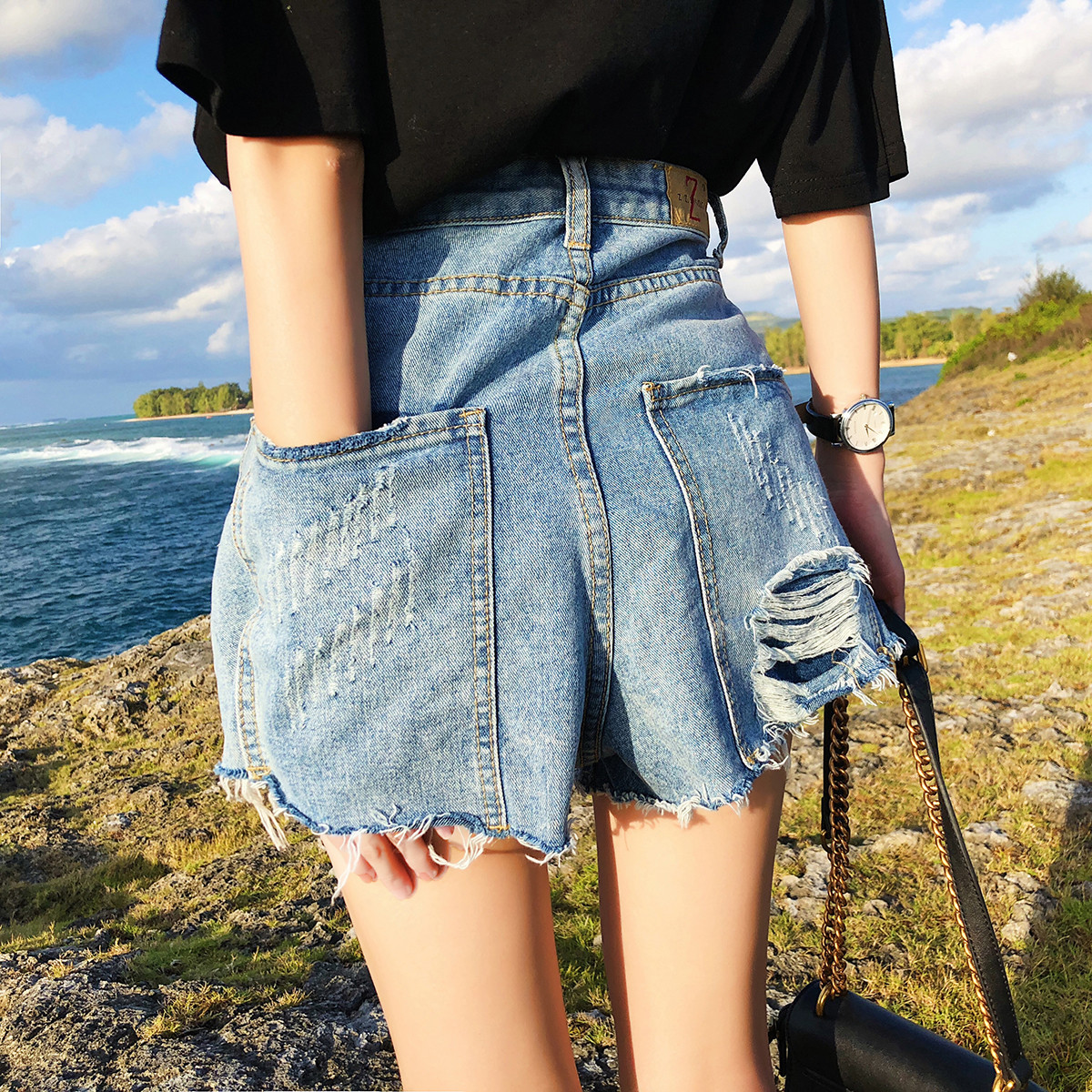High waist denim shorts female summer 2022 new large size slim loose with holes a character wide leg hot pants tide