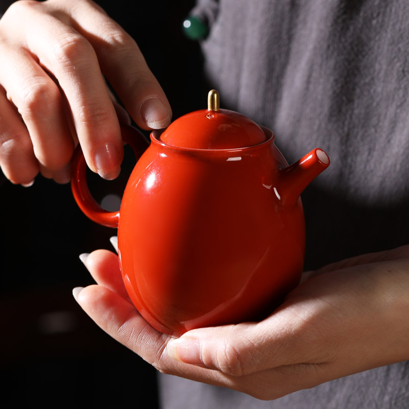 Coral red kung fu tea pure manual single pot ball hole, little teapot jingdezhen ceramic tea set color glaze