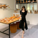 2022 new large size women's clothing design sense niche black dress cover belly to show thin Hong Kong flavor chic summer