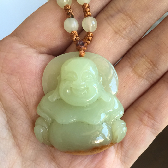 Yellow and white river mill jade Buddha yellow and white river mill jade pendant Buddha processing Xiu jade yellow and white old jade and Tian jade pendant Buddha jade Buddha