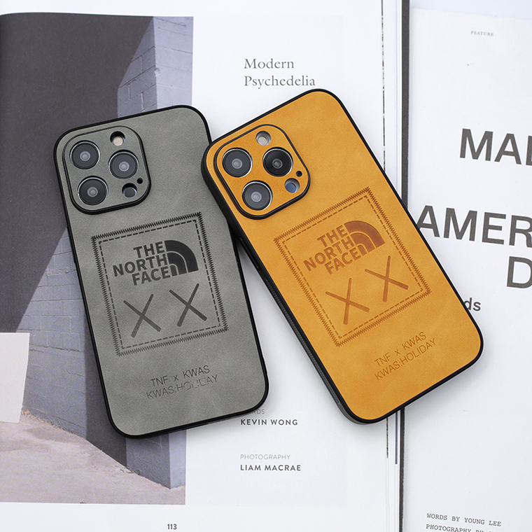 The North Face New Kaws Non Slip Leather 14, 13, 12 iPhone Case