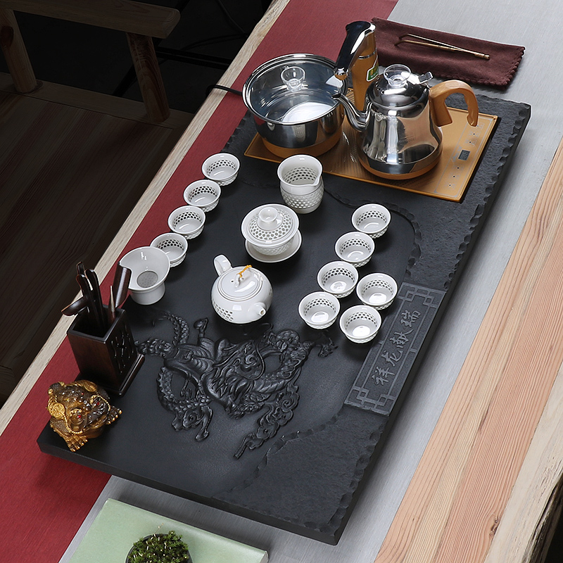 True sheng sharply stone tea tray of a complete set of tea set violet arenaceous kung fu tea tea tea taking. The Automatic drainage