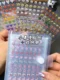 Mini sticker storage book small nose sticker pinch Le laser star sticker handbook material decoration sticker car