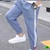 Quần thể thao nam mùa hè mỏng sweatpants loose-fitting mới trẻ em mùa hè váy mens phiên bản Hàn Quốc quần chân nhỏ màu đen quần duy nhất. 