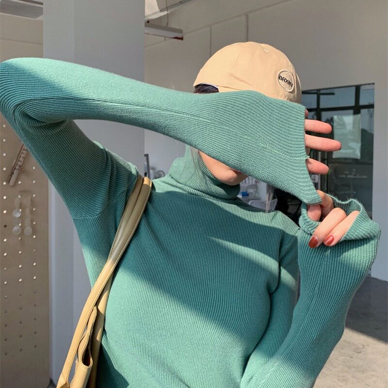 2022 autumn and winter new explosion style design sense of small foreign style inside with turtleneck bottoming sweater women's knitted sweater top