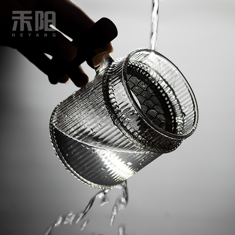 Hetian YangMu filtration, high - temperature transparent glass tea cup home tea separation take the flower tea cups