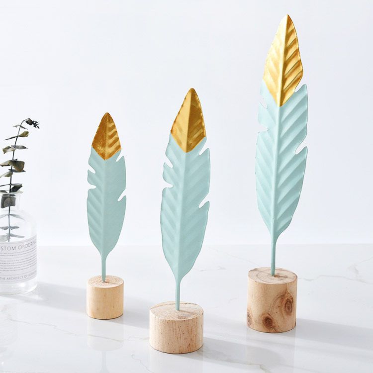 ins Nordic minimalist creative iron art feather living room table Xuanguan shop bedroom decorative desktop furnishing hem