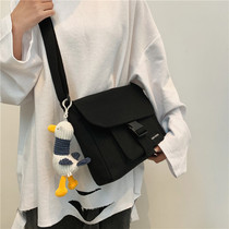 Korean version of simple canvas bag female crossbody bag 2020 new Japanese mens bag student Joker shoulder mobile phone bag