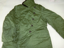 Stocked in the 1980s the 65-style cotton coat is a long pure cotton thick coat that is warm and durable a genuine collection.