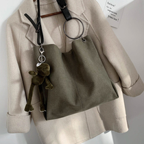 Bag Womens autumn and winter 2021 New Tide commuting senior sense shoulder crossbody tote niche canvas bag large capacity