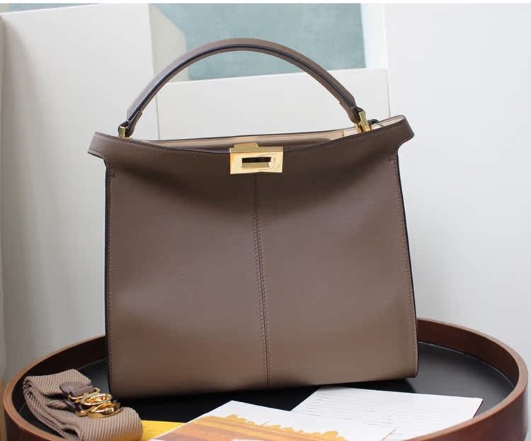Style 8Domestic purchasing agent quality goods Cofandi Litchi peel peekaboo kitten Little monster Bucket bag One shoulder Messenger Female bag