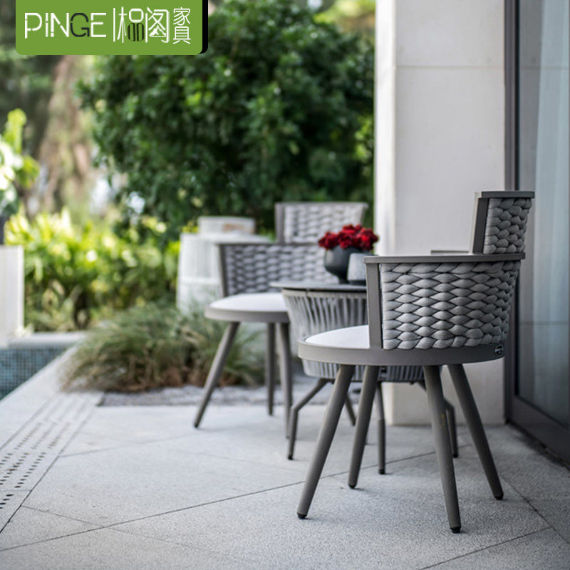 Outdoor furniture rattan chair designer creative leisure rope table and chair garden courtyard balcony rattan chair coffee table combination