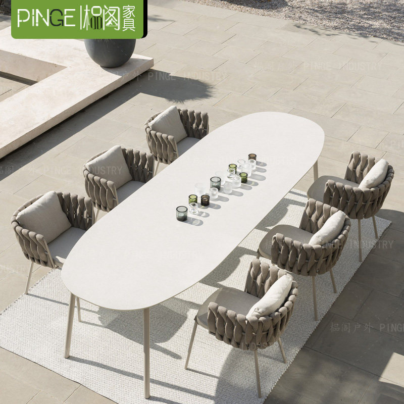 Outdoor rattan table and chair creative open-air ribbon villa balcony courtyard rattan rope chair hotel leisure courtyard Nordic