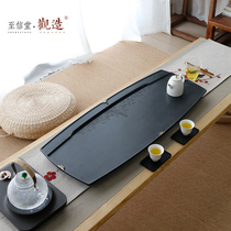 View a whole piece of natural Wujin Stone tea tray hand-carved stone tea table stone Tea home simple tea set