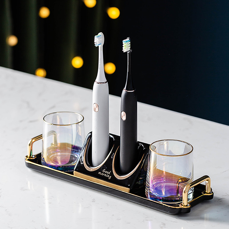 Light luxury high-end electric toothbrush holder seat bathroom water table storage shelf swing table type free hole gargle cup set