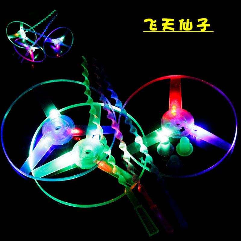 Hand push UFO luminous bamboo dragonfly flying fairy toy slingshot flying arrow Frisbee night market Yiwu stall hot sale