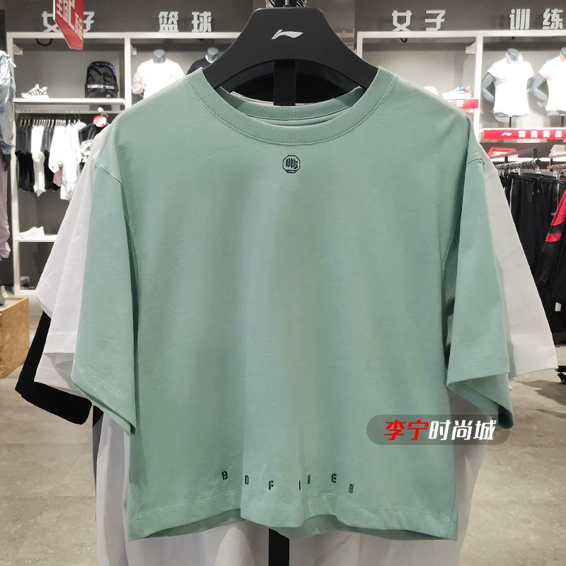 Li Ning áo thun ngắn tay rộng rãi phụ nữ mùa hè 2020 sản phẩm mới bóng rổ loạt bông tinh khiết thoáng khí đầu ngắn AHSQ106 - Áo phông thể thao