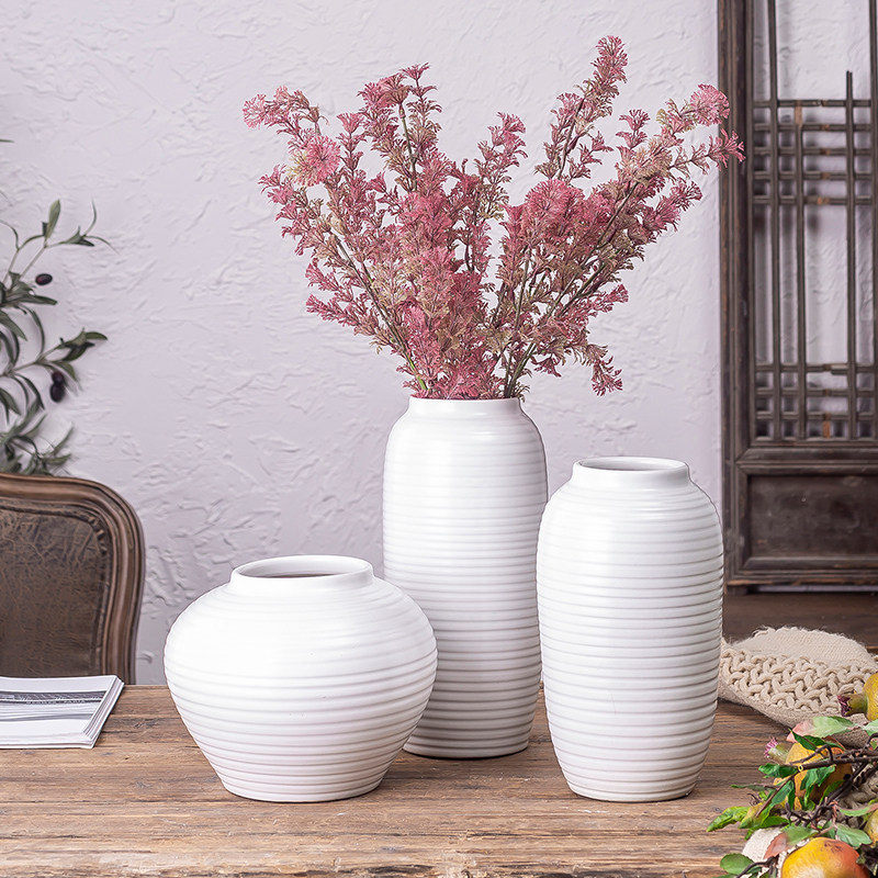 The white ceramic hydroponic bottle Jane modern Nordic furnishing articles living room flower arrangement table dry flower vase suits for