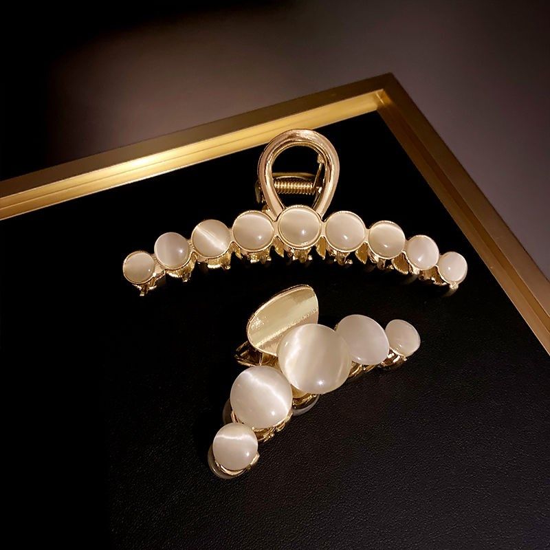 2021 New cat eye clip female head grab clip large Han edition temperament card grab and clip pearl clamp headset