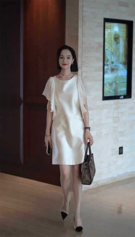 Trendy and Simple Dress with a Stylish Design in 2024, Featuring a Round Neck, Mesh Sleeves, Ruffled Edges, and a Bodycon Fit