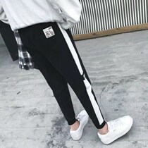 Sports and leisure school uniform pants mens Korean version of thick thigh nine-point pants with white strips black pants plastic feet pants summer