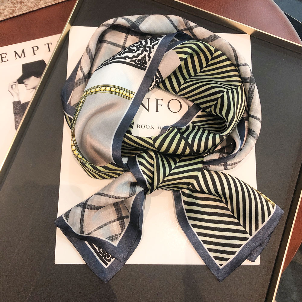 The temperament is simple and silk silk female spring and autumn thin 100 % sand silk long strip with windwear small tissue suit