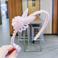 Светло -апельсиновый меховой шарик розовый кролик уши