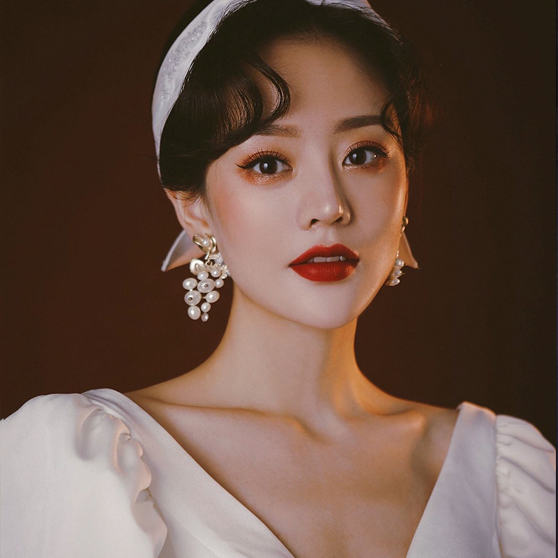 Pearl old ear acupuncture French retro court grape tassel Hong Kong earrings exaggerated European and American temperament elegant fairy