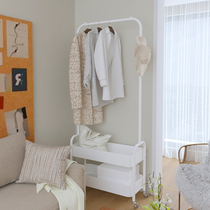 Bedroom with clothes hangers on floor Home multifunction clothes hangers Hanging Bags Containing Shelve Cabinet Nemesis Red Cloakhat Rack