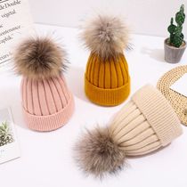 Childrens woolen hat Autumn and winter Korean version of the baby raccoon hair ball warm ear protection hat Baby cashmere knitted pullover hat